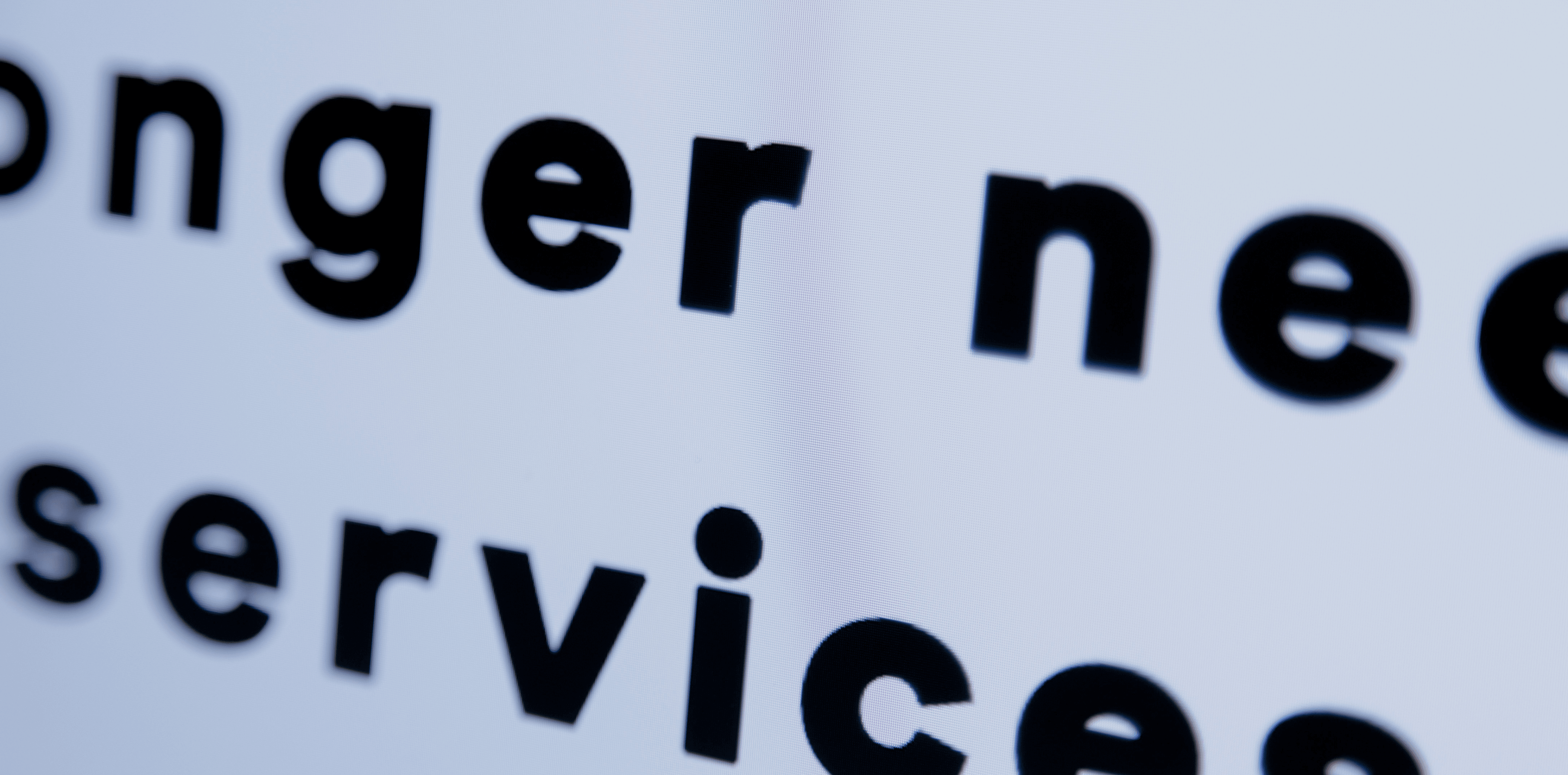 Unclear message showing letters to words on the right and left and below you see the word services.